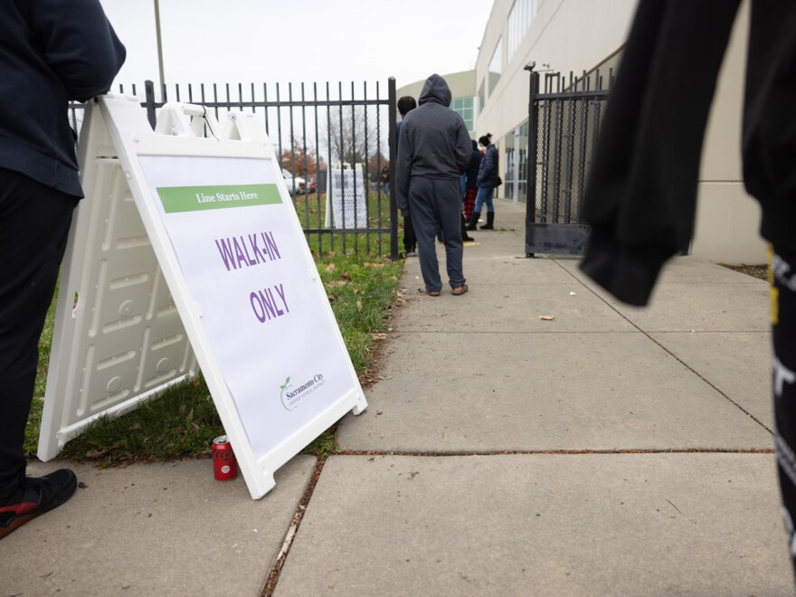 Image of a line outside a COVID testing center in California