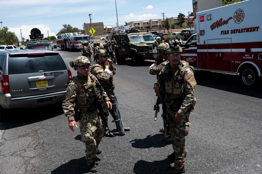 Law enforcement agencies respond to an active shooter at a Walmart near the Cielo Vista Mall in El Paso, Texas, on Saturday.