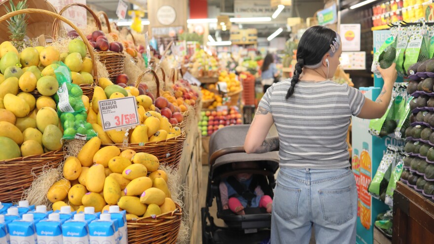 People shop at a market in Brooklyn, New York City, on June 12, 2023.