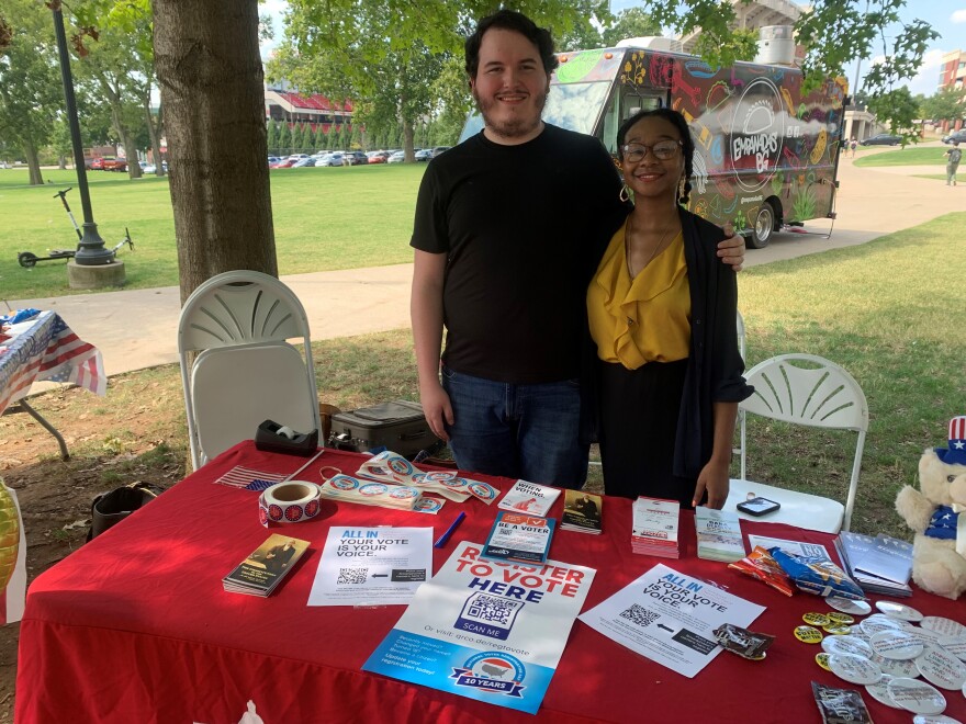 WKU students Blake Clark and Darinda Reddick man a voter registration table on the Bowling Green campus.