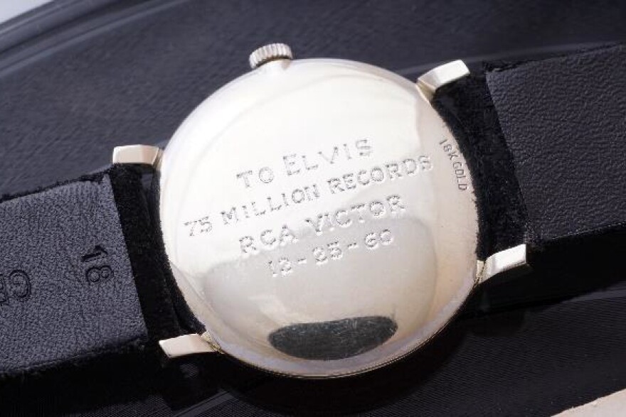 The watch's inscription commemorates Elvis's record sales.