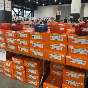 Dutch ovens on sale line tables at the Le Creuset factory-to-table sale in Milwaukee on Oct. 1, 2026 at the Baird Center.