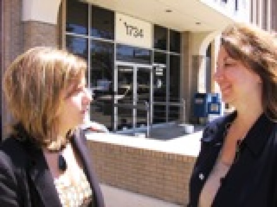 Cindy Circo (L), KC Councilmember and aide Gina Boucher after foreclosure remedy sessions are announced.