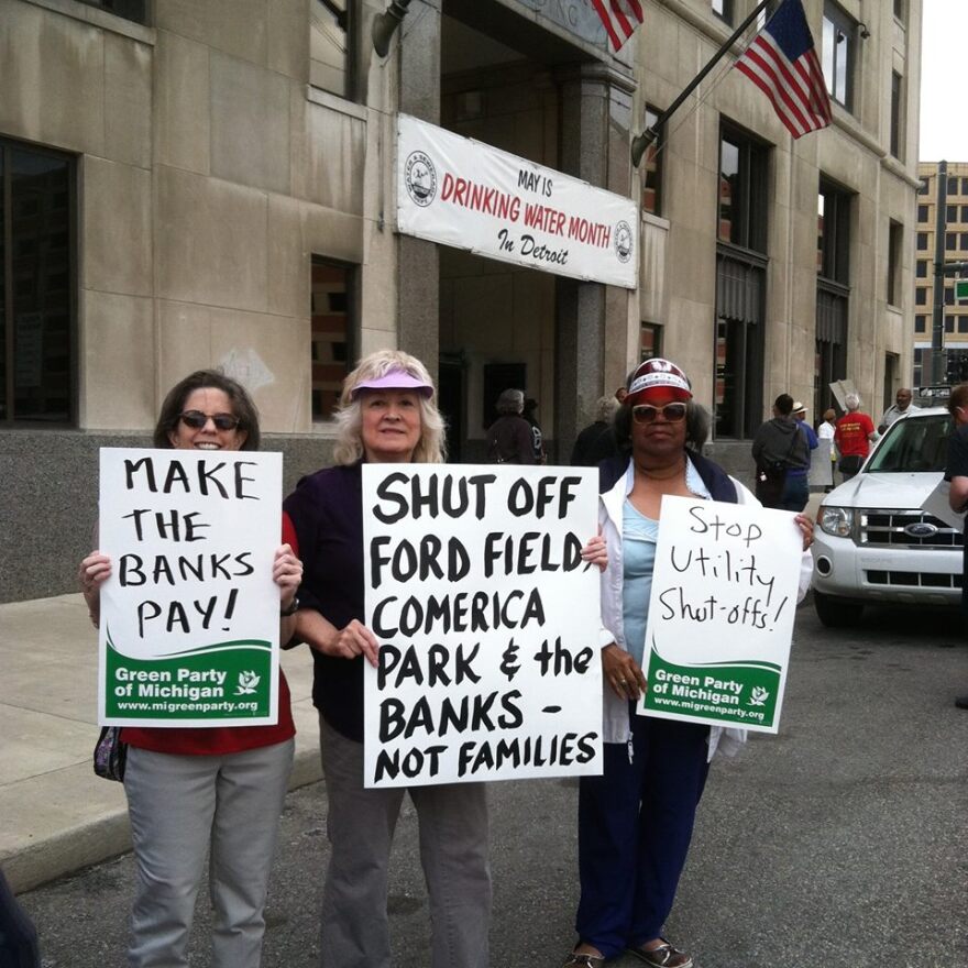 Supporters of the Michigan Green Party visit the Detroit Water & Sewerage Department.