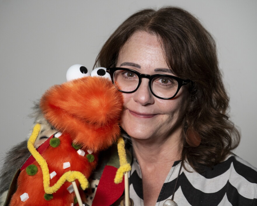 Jen Greenwood and her hot dog puppet, Princess Poppy Chicago von Pupperstein, or "Puppy-C" for short.