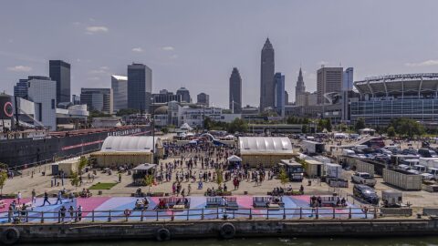 A photo documents Downtown Cleveland lakefront activities organized in 2025 by the nonprofit North Coast Waterfront Development Corp. to activate the area identified for future parks and development projects.