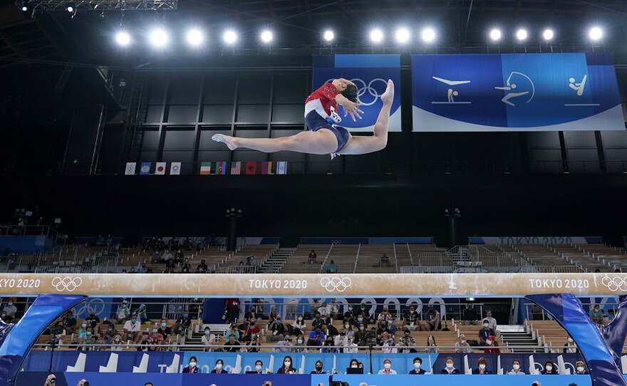 Sunisa Lee, of the United States, performs on the balance beam during the artistic gymnastics women's final at the 2020 Summer Olympics, Tuesday, July 27, 2021, in Tokyo.