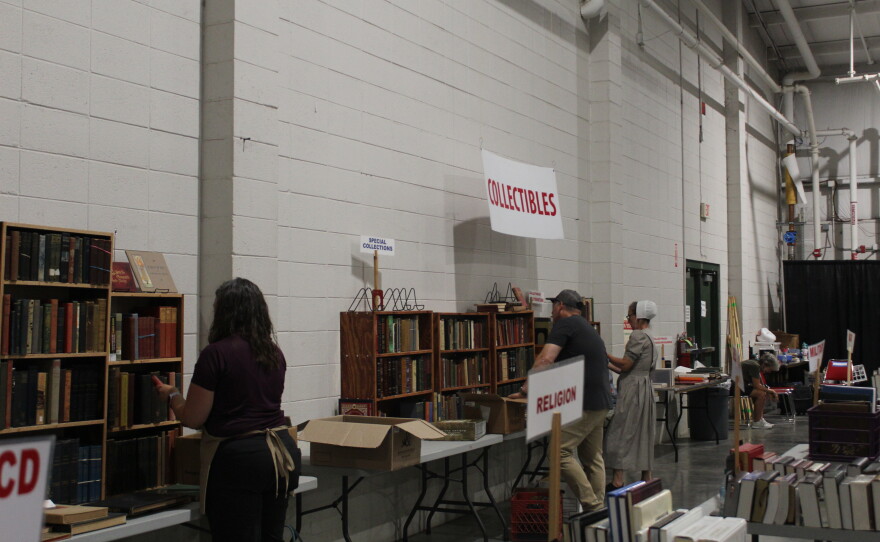 Friends of the Library volunteers help set up the 2026 Fall Book Sale. (Photo taken on September
