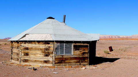 A Navajo hogan is a traditional dwelling that holds significant ceremonial and traditional significance.