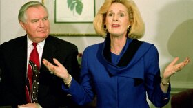 In this March 2, 1995 file photo, Word of Faith Fellowship church leader Jane Whaley talks to members of the media as husband Sam listens during a news conference in Spindale, N.C. Whaley has persuaded a magistrate to issue trespassing charges against Democratic candidate David Wheeler, who brought supporters and a TV crew along to a scheduled meeting at the church. Wheeler says he was invited by Whaley to visit the church, which has been accused of beating congregants to expel demons.