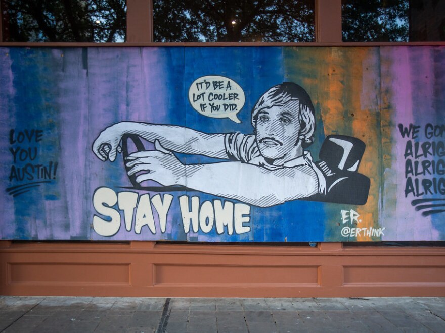 Murals adorn boarded up businesses along 6th Street downtown. Businesses across the city were shutdown due to the global coronavirus pandemic.