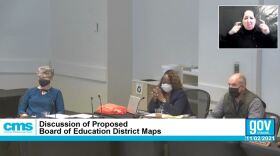  CMS Board member Carol Sawyer (left) drew a political map that removed a possible opponent from her district.