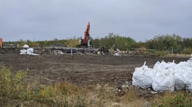 Cement is being crushed at the old Bureau of Indian Affairs headquarters building at the end of BIA Road in Bethel on Sept. 9, 2024. (Corinne Smith)