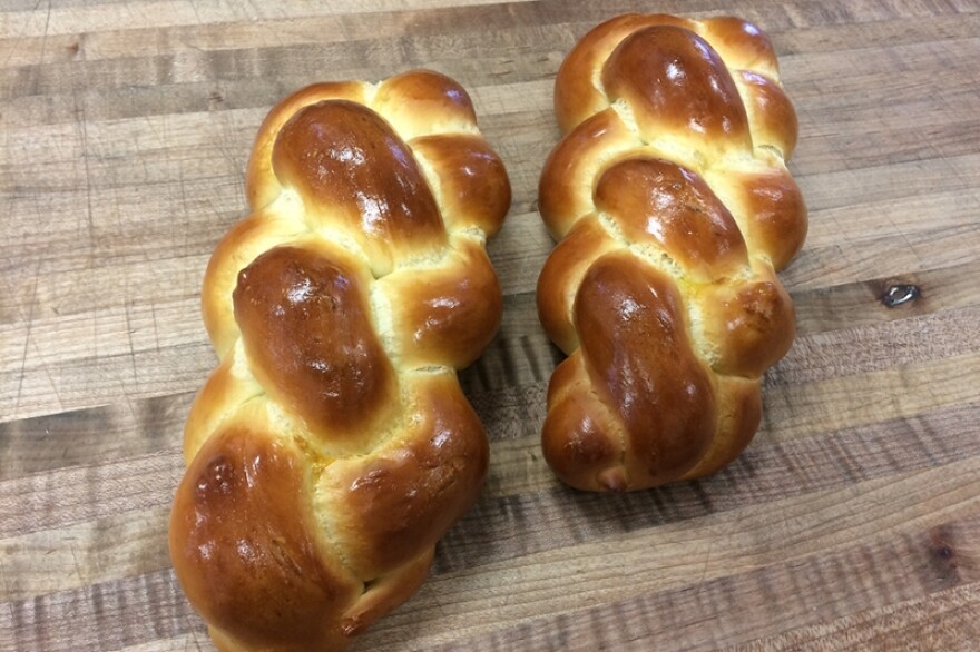 A light egg wash before baking makes for a shiny, golden-brown finish on these braided loaves.
