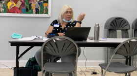 A volunteer waits during a low-cost legal clinic, offered by the Venezuelan Alliance and the Latin American Coalition, to assist Venezuelans applying for TPS.