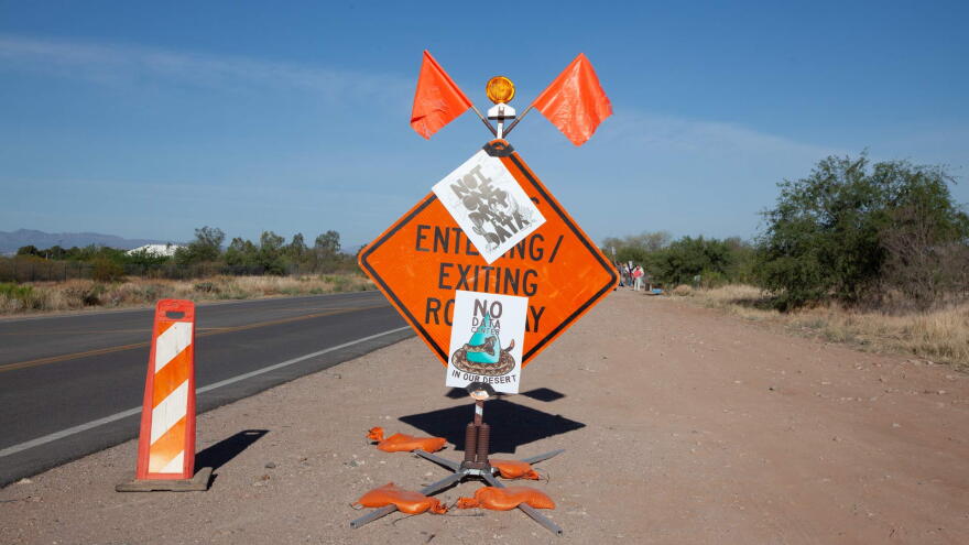 Anti-data center signs on traffic signage near the Pima County Fairgrounds southeast of Tucson. April 24, 2026.