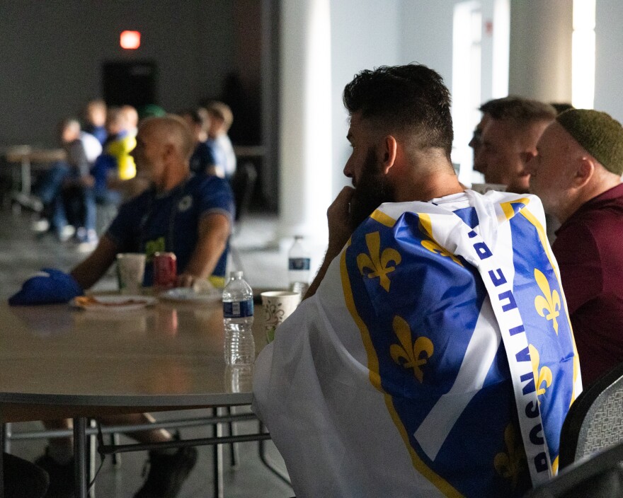 A fan nervously watches the USA vs. Bosnia game.