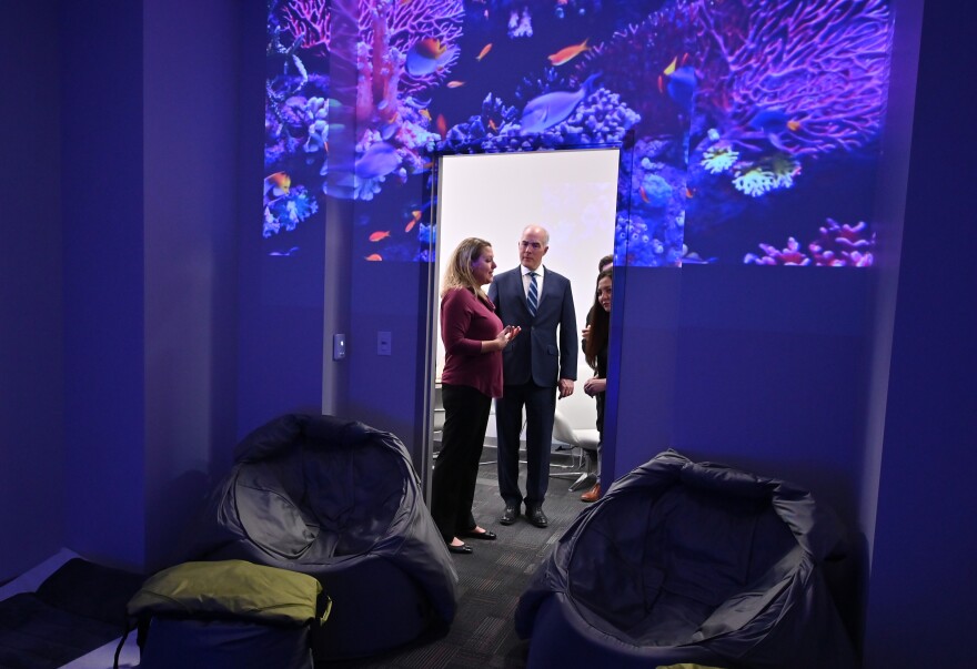 Dr. Jennifer Dessoye, chair of the Occupational Therapy Department at King's College, shows U.S. Senator Bob Casey the sensory room inside the college's Frank and Carolyn Kowalski Center for Advanced Healthcare Education.