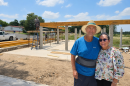 Scott and Juliet Welden in front of the construction of their new home in Kerrville