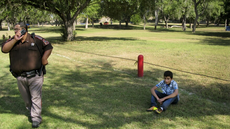 Jorge Romero, 16, a Salvadoran migrant, waits for the Border Patrol in McAllen, Texas.