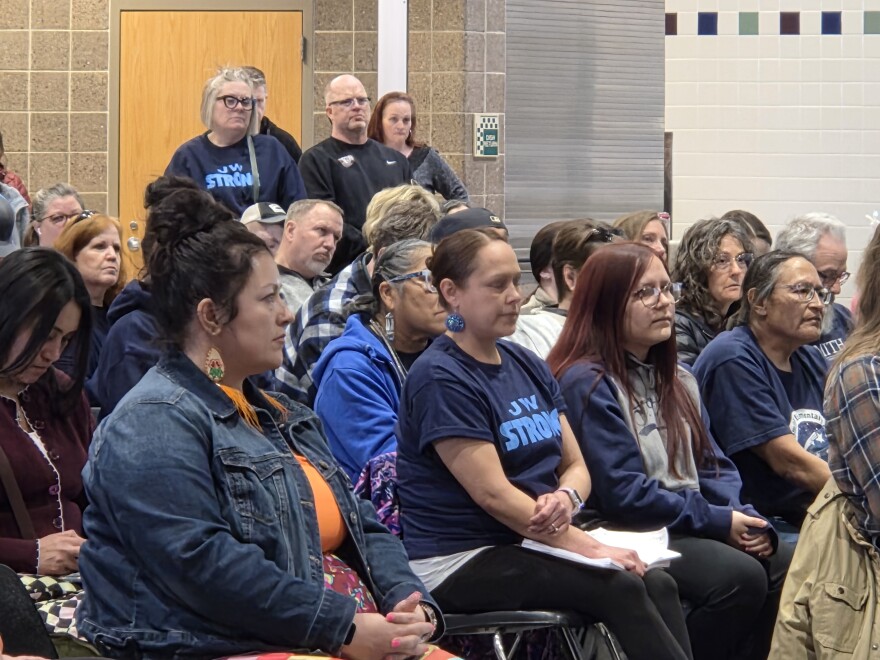 J.W. Smith staff sport "J.W. Strong" t-shirts during a public hearing on the J.W. closure at Bemidji High School on March 24, 2026.