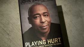 "Playing Hurt," by John Saunders, with John U. Bacon. (Robin Lubbock/WBUR)
