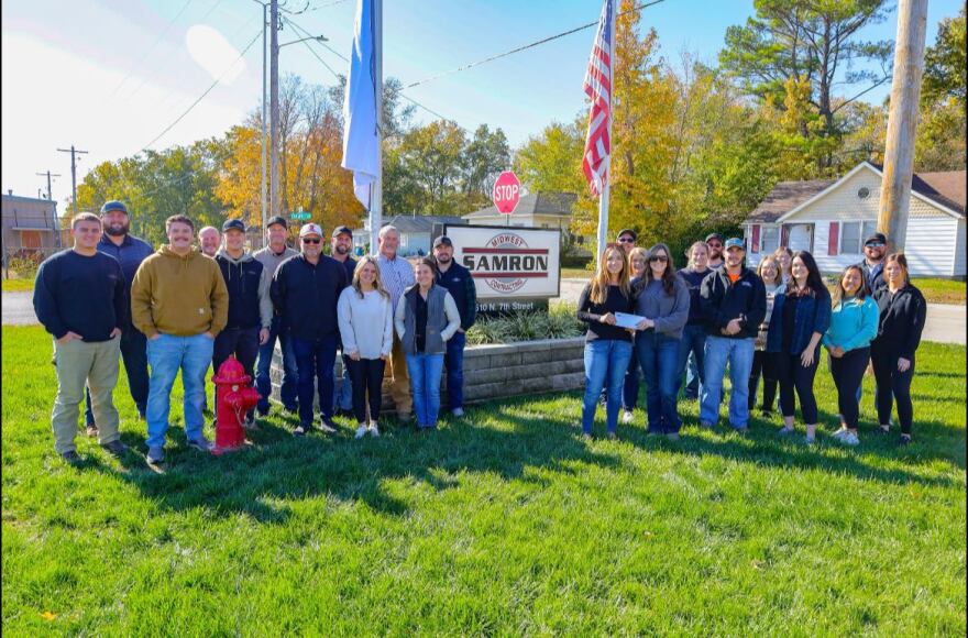 Samron employees presenting their $11,000 check to the Murphysboro Food Pantry.