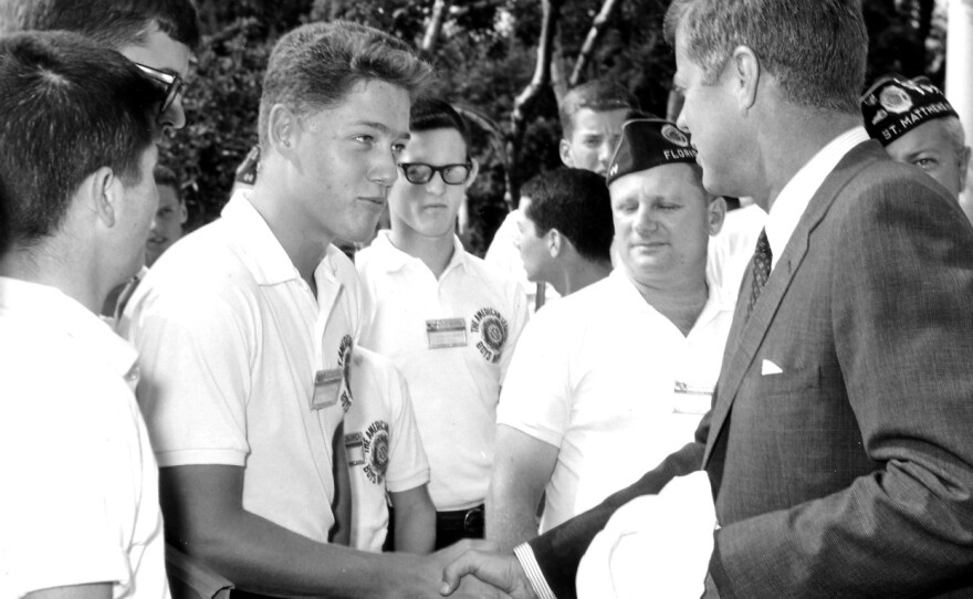 A young Bill Clinton meets President John F. Kennedy in the Rose Garden on July 26, 1963. Clinton, who was 16 years old at the time, was part of the Arkansas delegation to the American Legion Boys Nation.