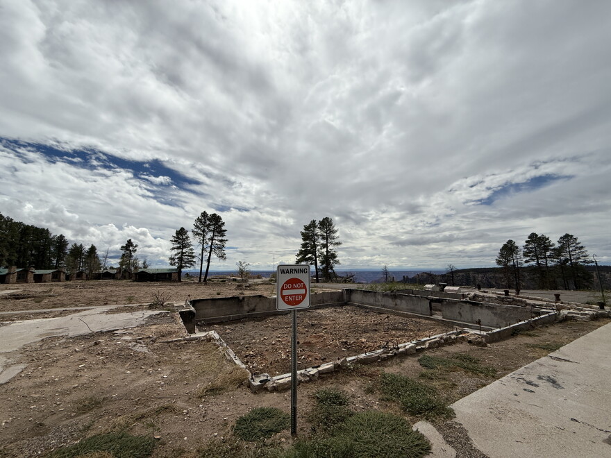The burned foundations of several buildings, including the Grand Canyon Lodge, remain on Sept. 6, 2026 on the North Rim of Grand Canyon National Park after they were destroyed by the 2025 Dragon Bravo Fire.