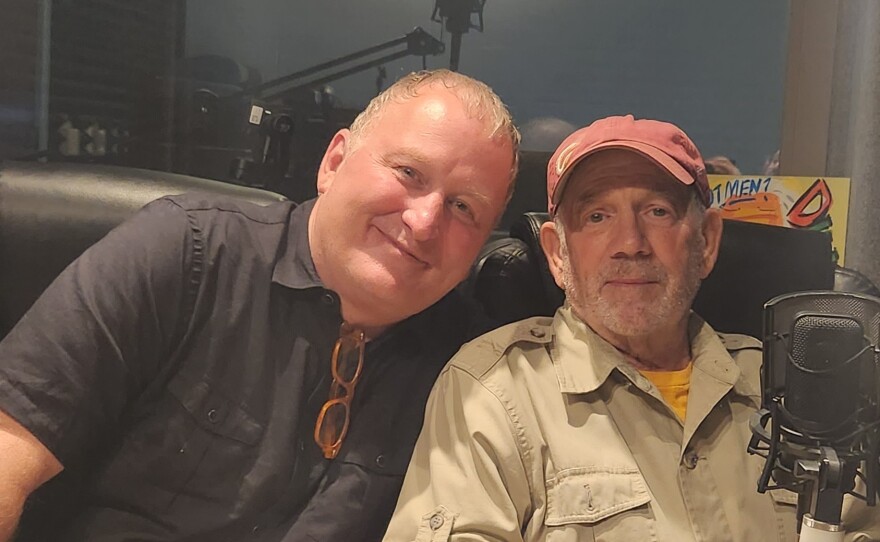 Bob Rauschenberg Gallery Director and co-author of "The Beginning was the End: DEVO in Ohio" Jade Dellinger (left), and DEVO co-founder and original band member Bob Lewis (right) in WGCU's "Gulf Coast Life" studio