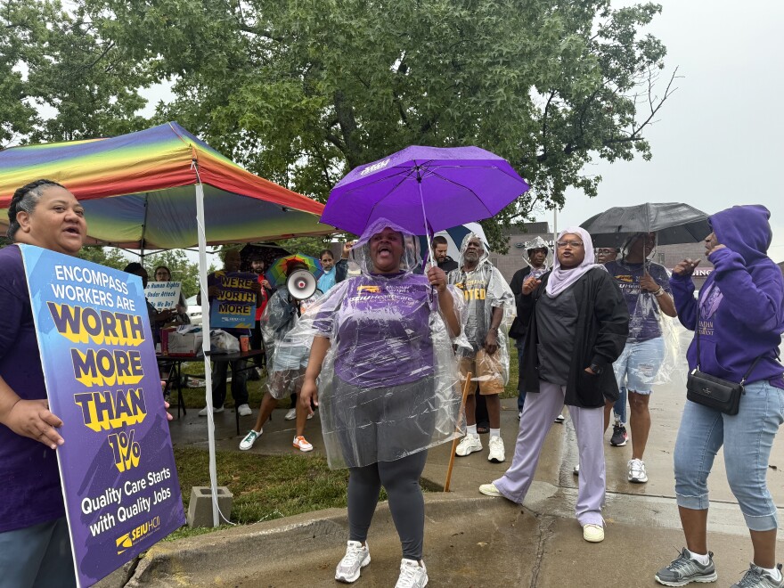SEIU union members and Encompass Health Group employees picketed outside of Encompass's Wornall clinic Monday. They're calling for better wages for existing employees.