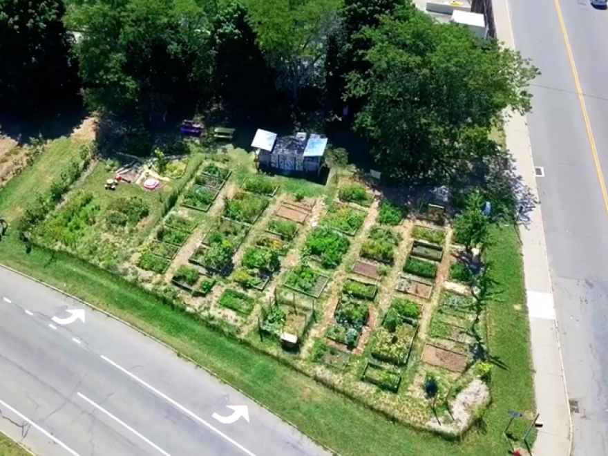 An aerial view of 490 Farmers at the corner of Broadway and Meigs Street.