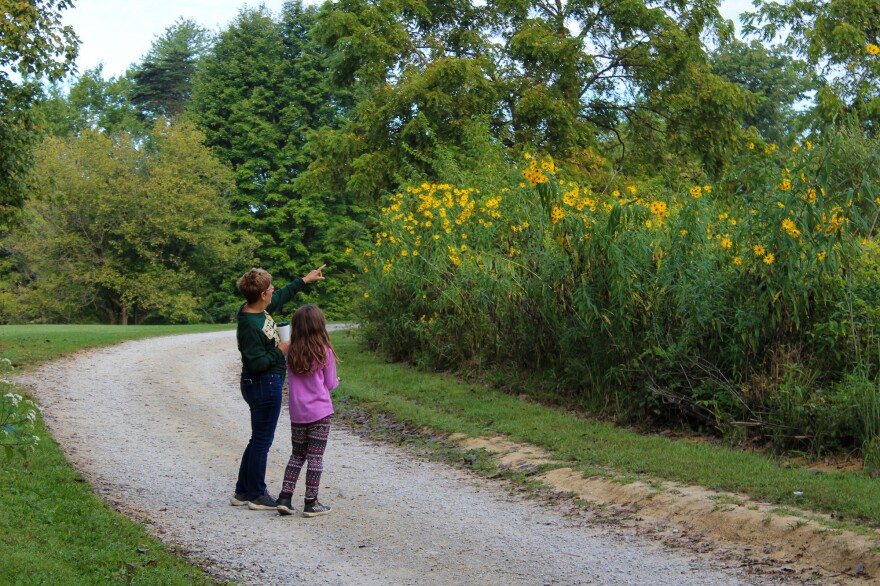 Berkshire, the camp director, and other mentors spend one-on-one time with campers. One child said they feel like this is their "real" home and the other home they live in full time is a "backup." [Kavitha Cardoza for NPR]