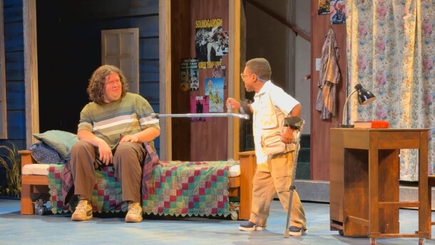 Netza Jimenez (left) and Cornelius Kittrell on stage