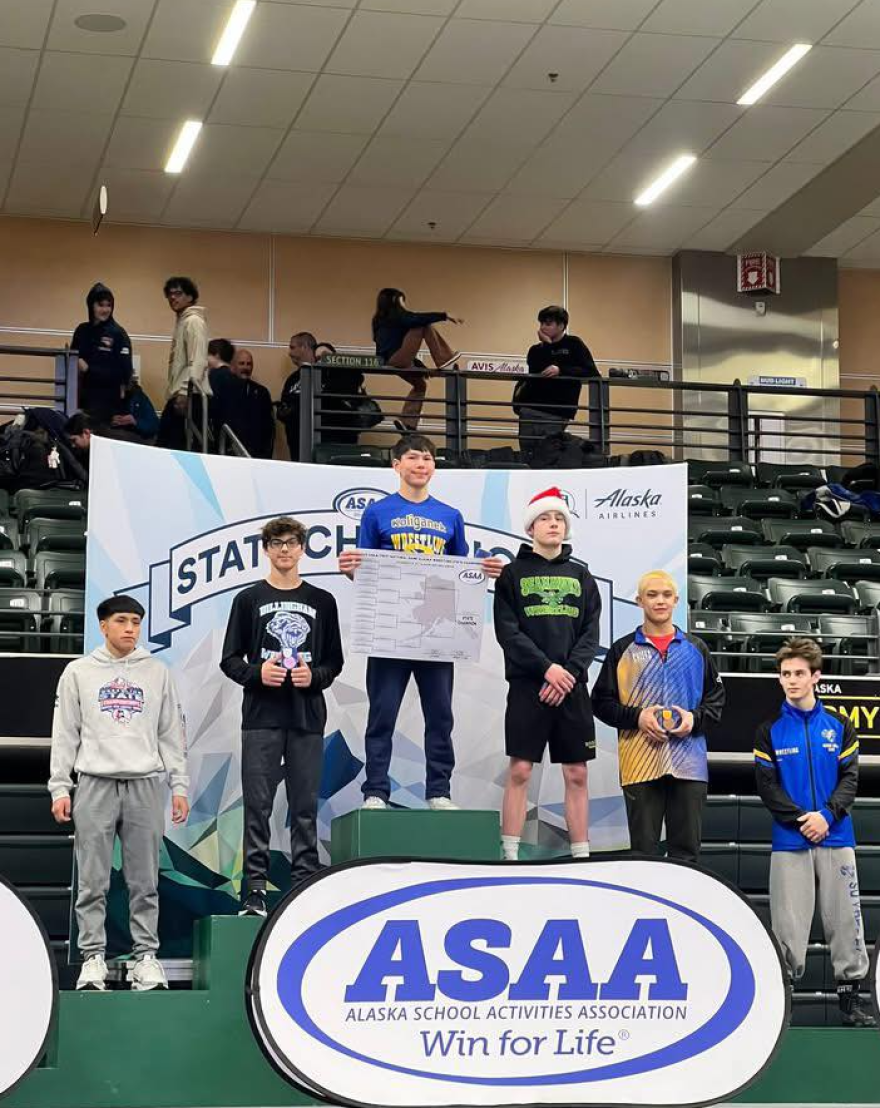 Koliganek's Gusty Tunguing IV on the podium at first place and Dillingham's Chasen Savo on the podium at third place.