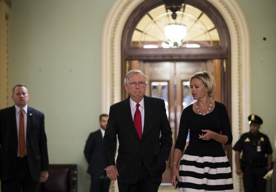 Senate Majority Leader Mitch McConnell (R-Ky.) walks with an aide as he leaves the Senate floor following a Motion to commit vote on HR 1628 (American Health Care Act) on Capitol Hill, July 26, 2017 in Washington. (Drew Angerer/Getty Images)