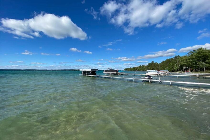 Growing problems with pollution from leaky septic systems is fueling controversy in lakeshore communities across Michigan. Communities around Higgins Lake, pictured here, are debating whether to swap septics for sewers in hopes of saving the lake.