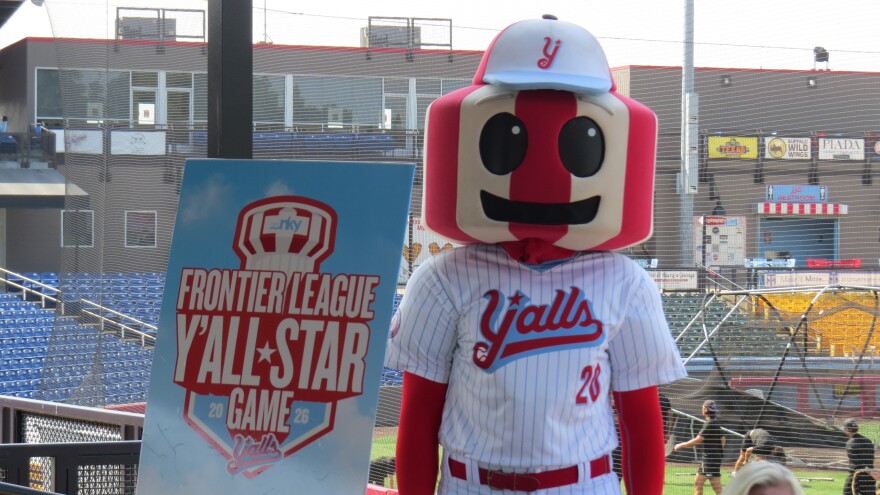 Florence Y'alls' mascot Y'all Star stands next to a sign for the 2026 Frontier League Y'all-Star Game