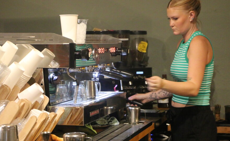 Campbell Horelica, Manager-In-Training at Majestic Coffee, making drinks last Friday morning. Photo by Allison Diaz.