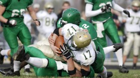 MRI scans before and after a season of football showed brain changes in a study of high school players.