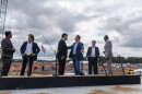 Gov. Jeff Landry talks with Hut 8 CEO Asher Genoot at the groundbreaking of the company’s West Bend data center in West Feliciana Parish, Louisiana, on Monday, October 5, 2026.