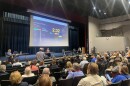 Frank Demenge speaks into a microphone at the DNR public comment meeting.