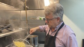 Volunteer John Chickering prepares dinner for 125 people at the Warming Shelter ILM on Thursday, Dec. 5. It's the fifth day of a five-day run.