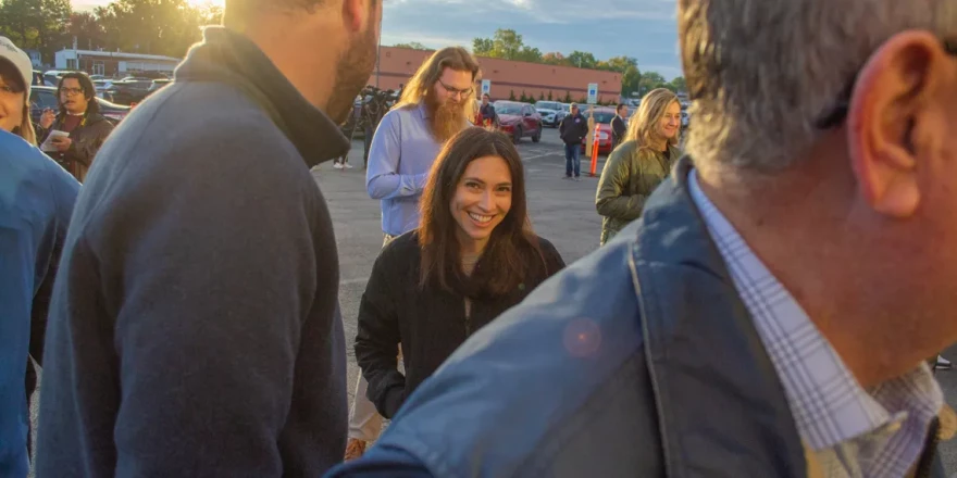 Democratic state representative and comptroller candidate Margaret Croke talks to a staffer on Gov. JB Pritzker’s campaign on Monday, Oct. 27, before filing nominating petitions for comptroller.