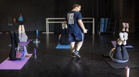 Damien Temperley leads an ab class at Aging Is Cool, an exercise program for older adults.