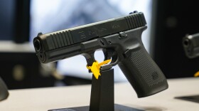 A Glock 45 9mm pistol is shown as guests browse firearms at the National Rifle Association's Annual Meetings & Exhibits in Indianapolis, Sunday, April 16, 2023. (AP Photo/Michael Conroy)