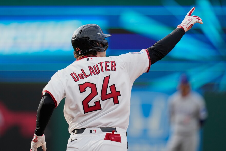 Cleveland Guardians' Chase DeLauter (24) celebrates his home run in the seventh inning of a baseball game against the Chicago Cubs in Cleveland, Friday, April 3, 2026. 