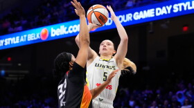 Dallas Wings guard Paige Bueckers (5) shoots as Connecticut Sun's Nell Angloma (33) defends in the first half of a WNBA basketball game Sunday, Aug. 30, 2026, in Arlington.