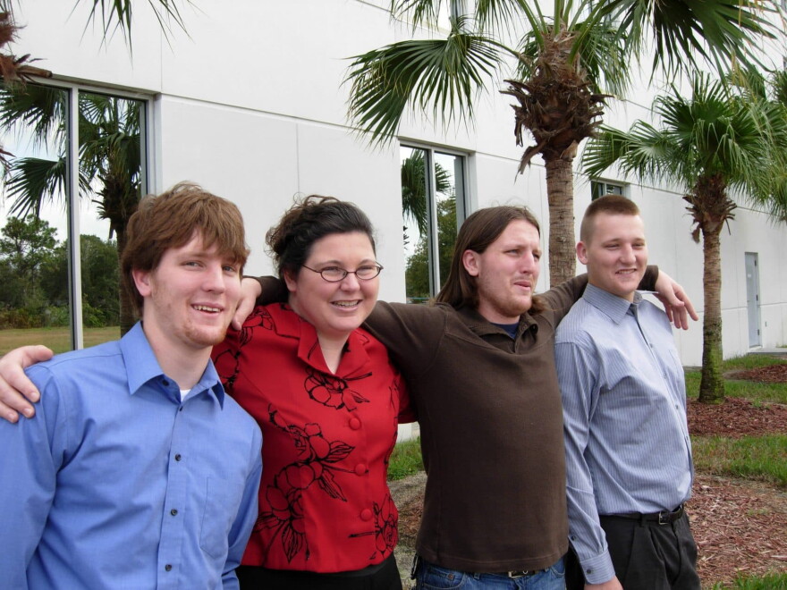 Ami Neiberger with her three brothers (L-R, Robert, Eric and Chris), together for the last time, in December 2006. (Courtesy Ami Neiberger-Miller)