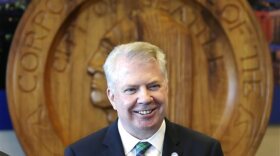 Seattle Mayor Ed Murray smiles as he addresses a news conference on a proposal to increase the minimum wage in the city Thursday, April 24, 2014, in Seattle.